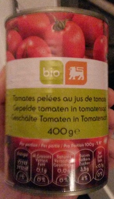 Image descriptive de Tomates pelées au jus de tomates